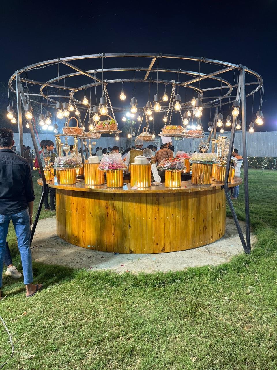 Buffet counter decorated with fabric drapes and themed elements